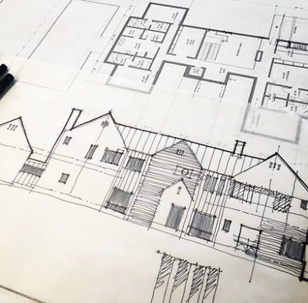 Architectural drawings showing building floor plans and elevations