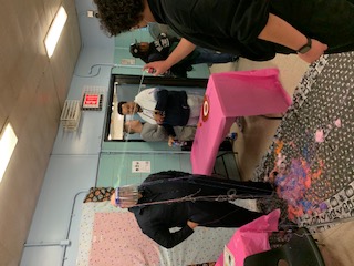 Students participating in a silly string fundraiser activity