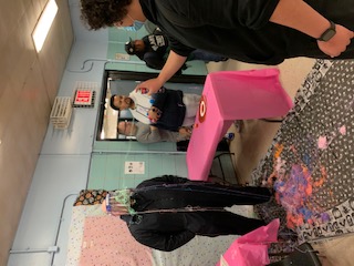 Students participating in a silly string fundraiser activity