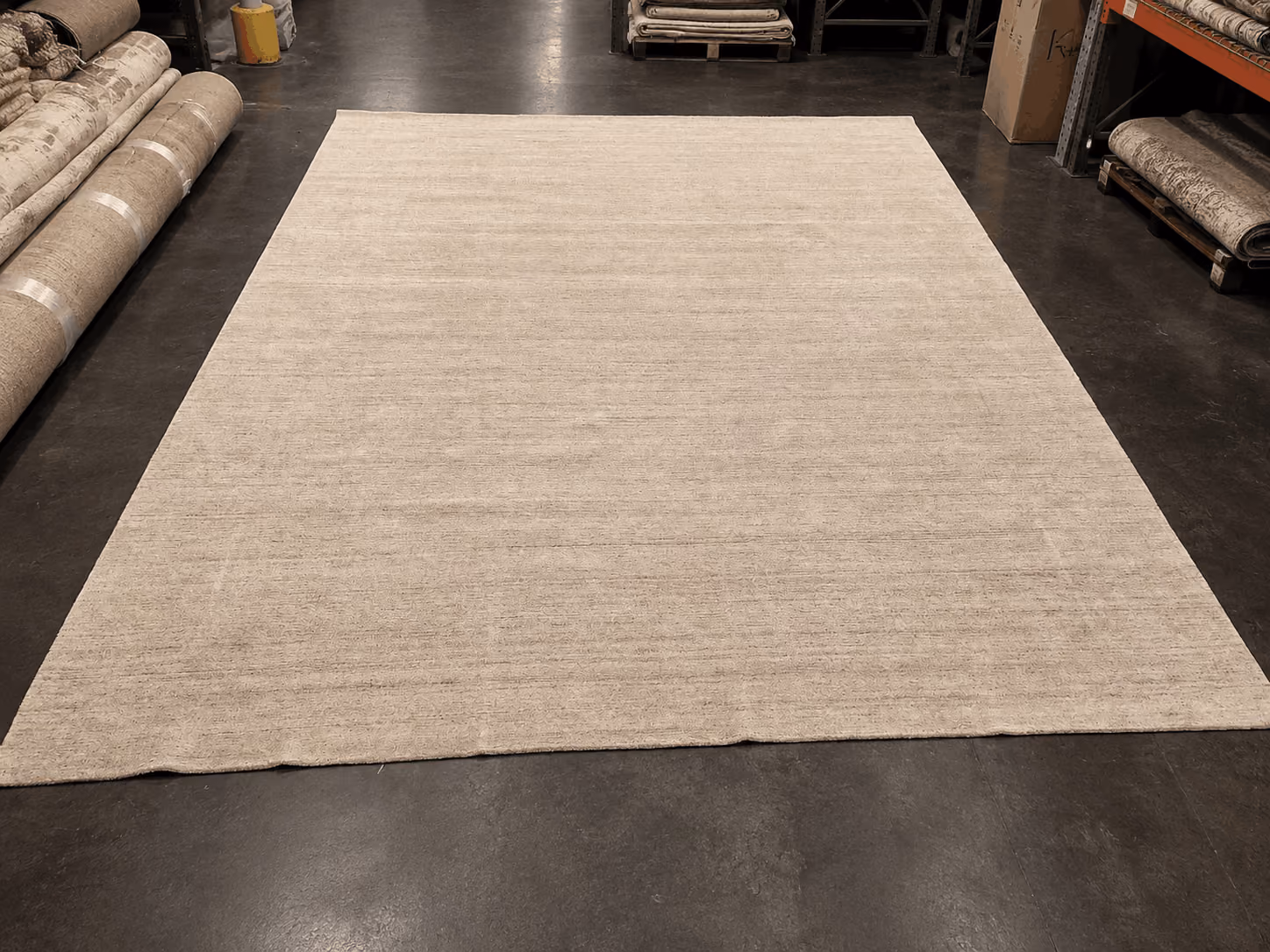 White area rug after professional damage repair in NYC