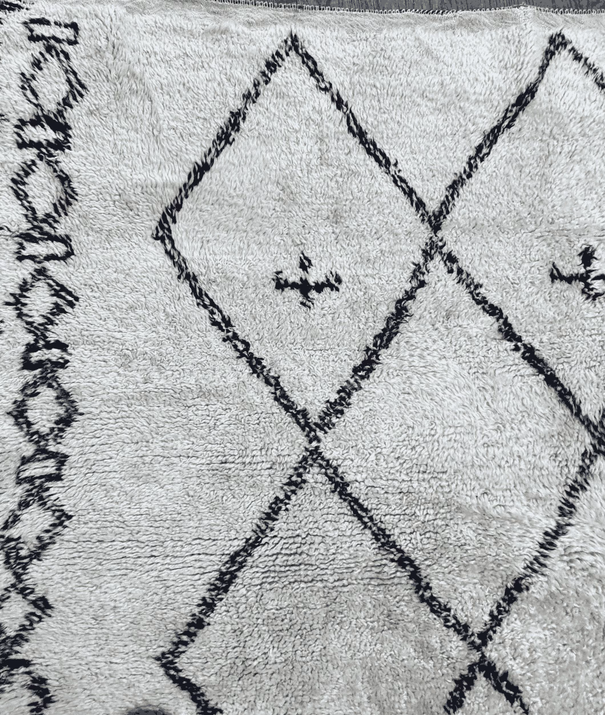The same rug after Rug Refinery's service, showing the finished result