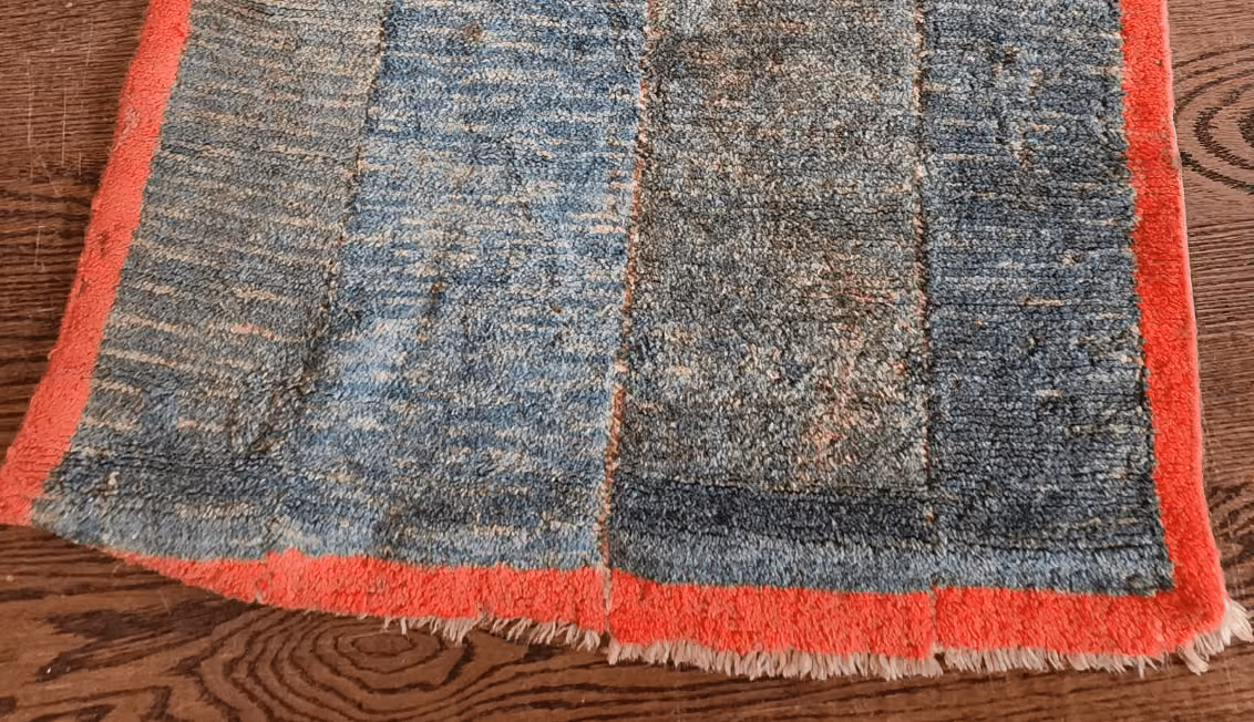 The same rug after Rug Refinery's service, showing the finished result