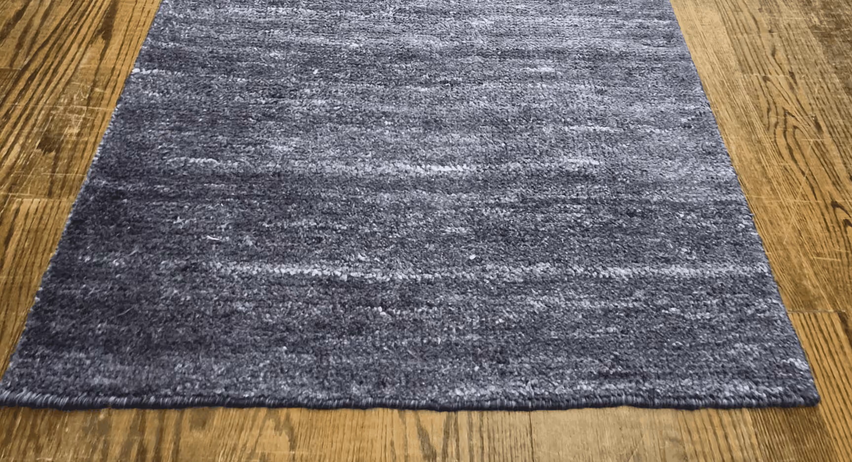 The same rug after Rug Refinery's service, showing the finished result
