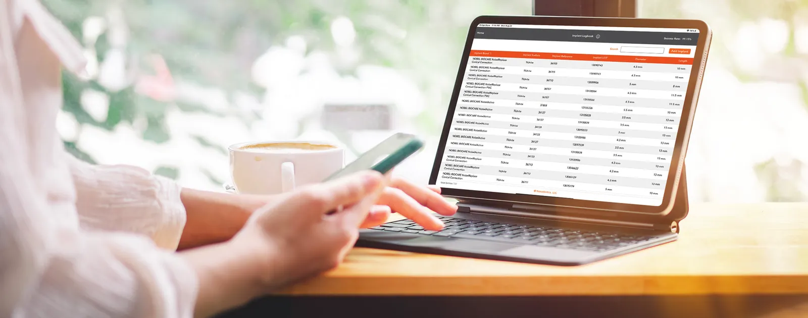 Novadontics patient list open on a tablet with a keyboard