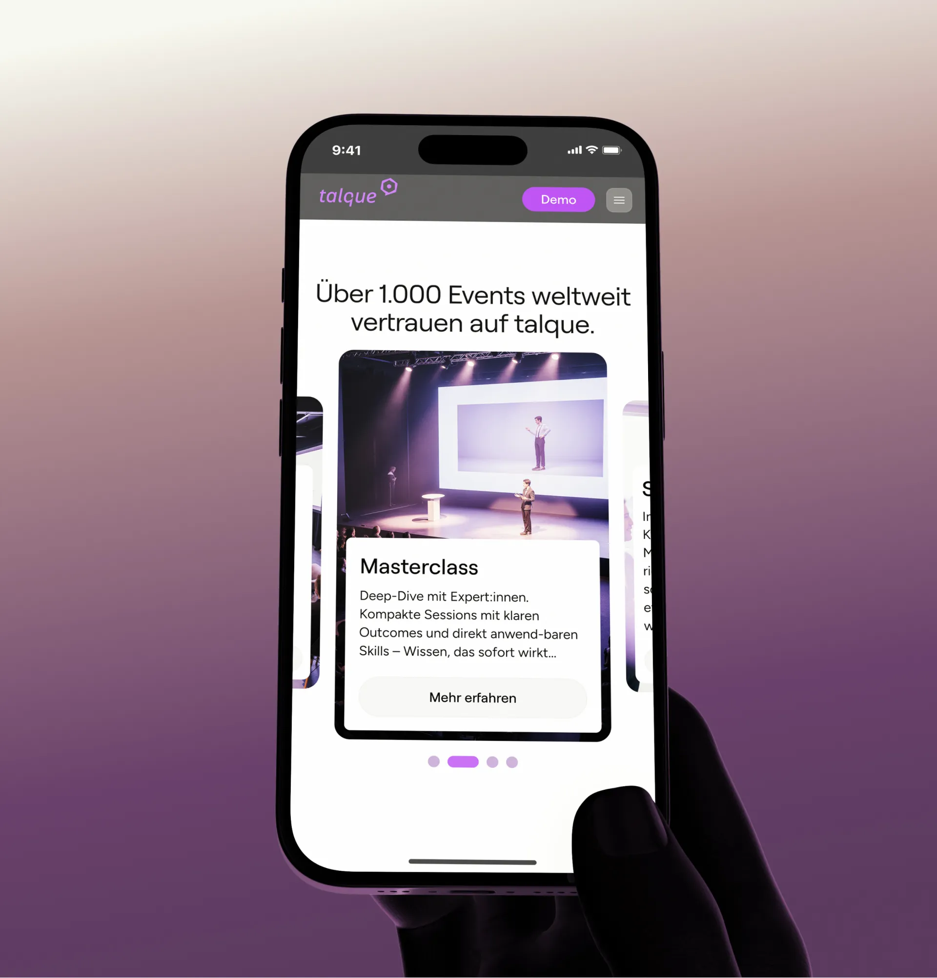 Hand holding a phone showing the talque page stating that over 1,000 events worldwide rely on talque