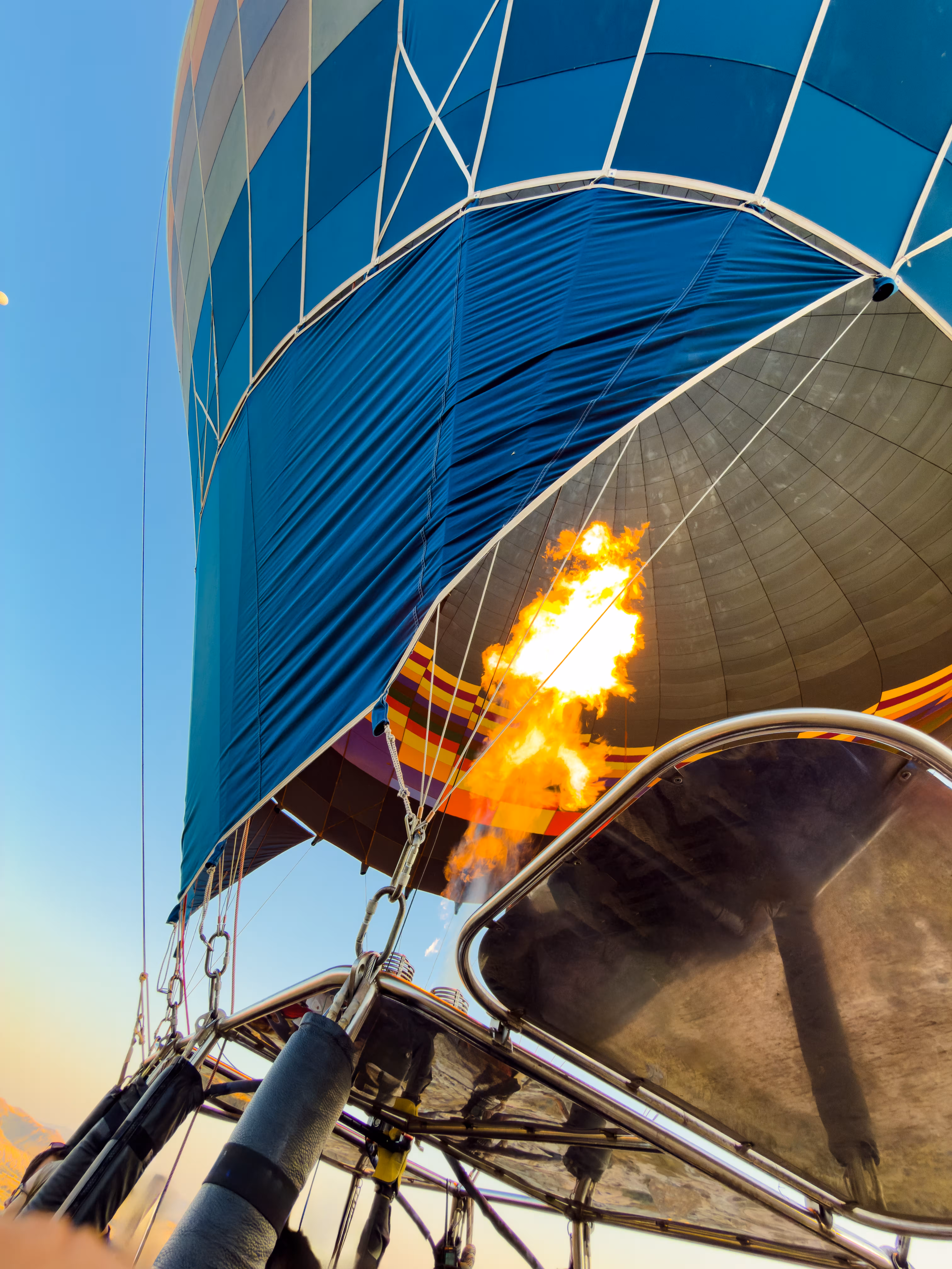 Burner flame inflating a hot air balloon before take-off in Cappadocia