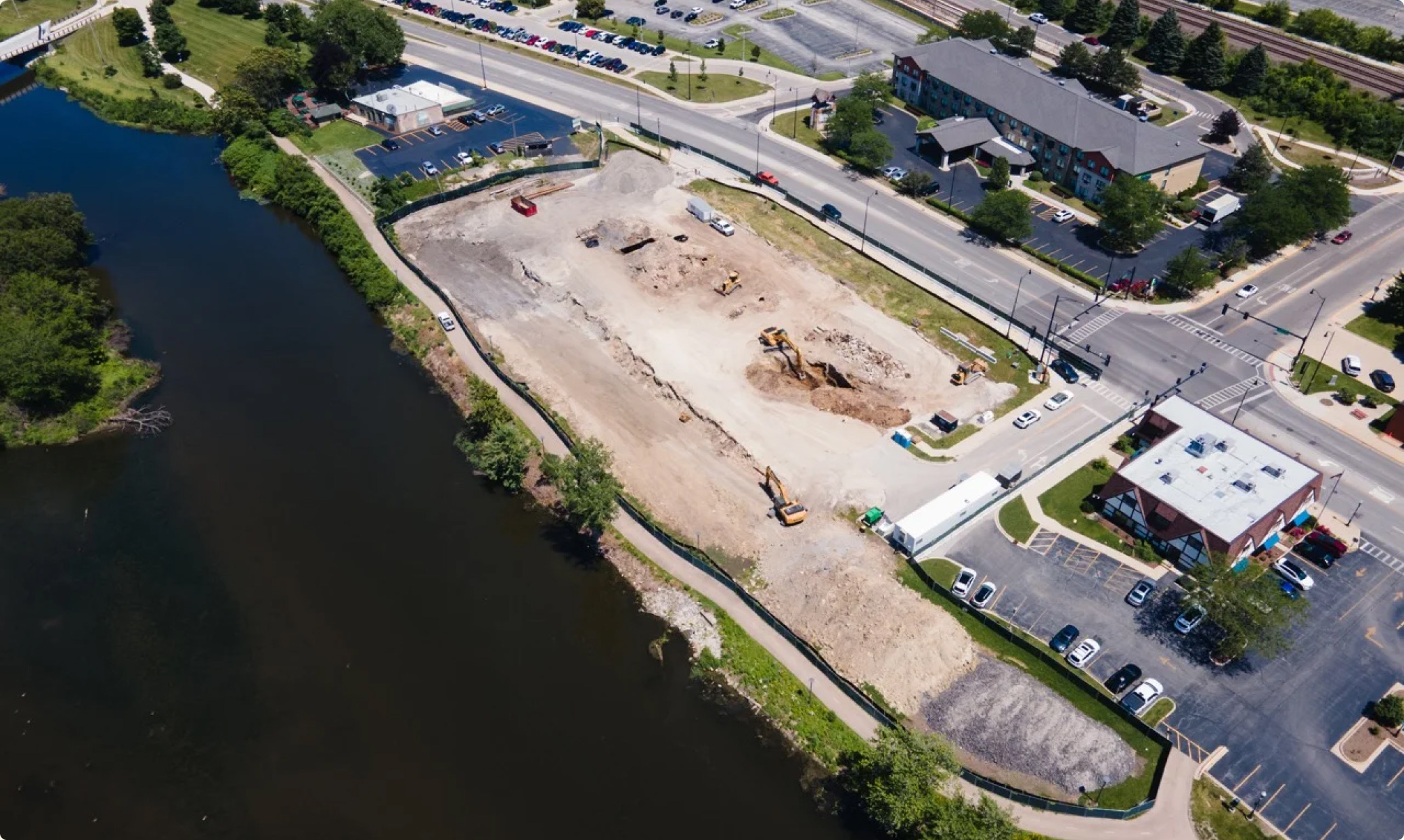 Aerial view of the Residences at Eastbank site along the Fox River in Aurora.