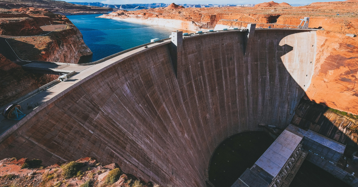 The Glen Canyon Dam, located in Arizona along the Colorado River, controls the river's flow, supplying water to over 40 million people across several states. Its hydroelectric power plant generates electricity to millions throughout the southwestern US.