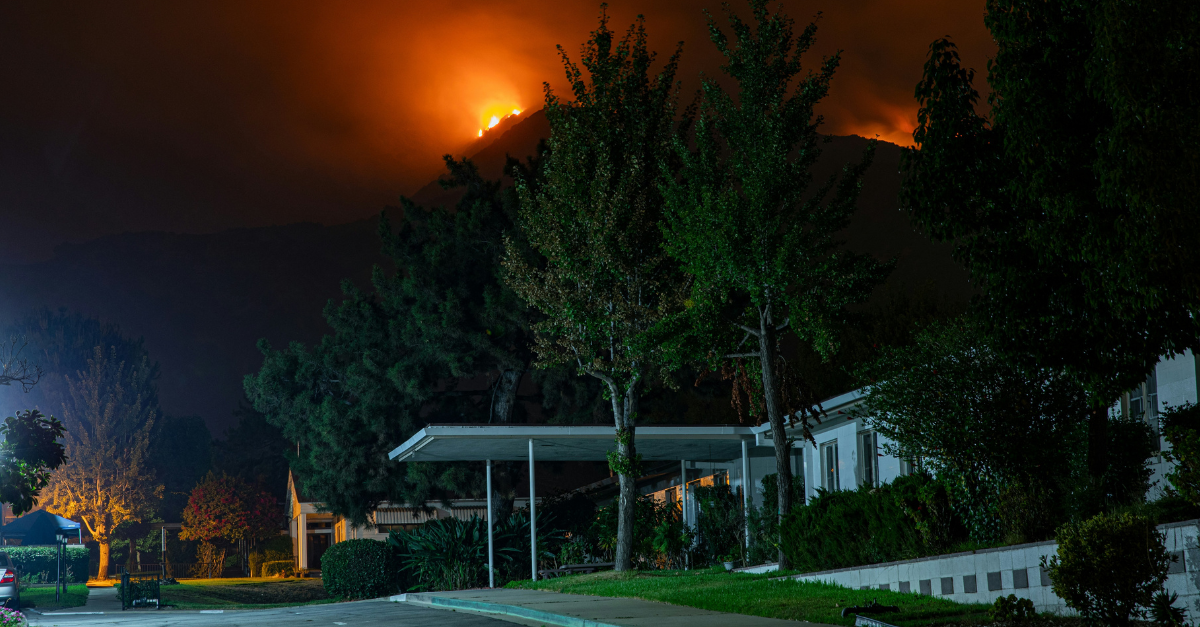 A photo showing a 2020 wildfire in Monrovia, California. The 2020 California wildfire season burned more than 4 million acres of land and caused billions of dollars in damages.