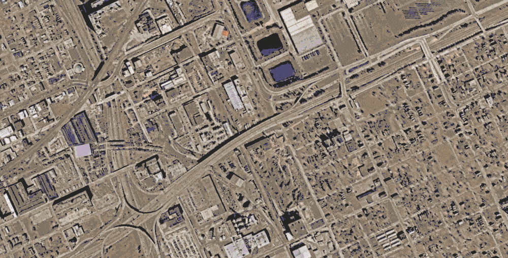 A sample of input imagery, impervious surface, and distinct vector layers extracted for the City of Detroit by Ecopia AI.