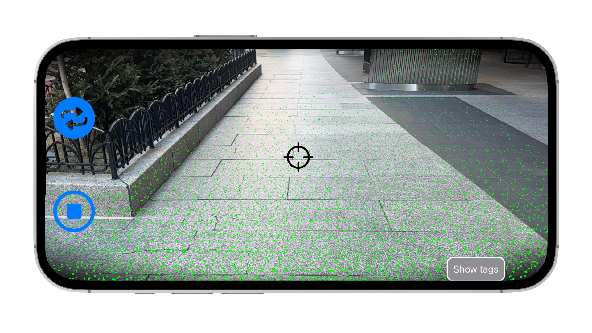 An iPhone running the DeepWalk app capturing a LiDAR scan of a city sidewalk