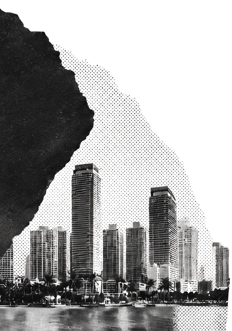 Black and white halftone image showing a city skyline with tall buildings along a waterfront, partially obscured on the left by an irregular dark textured shape.