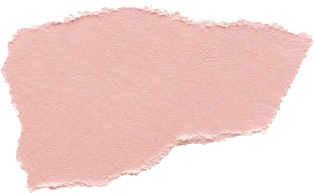 A torn piece of textured paper in a soft pink color with irregular edges and visible fiber details.