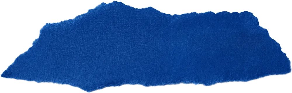 A torn piece of textured blue paper with uneven edges on a white background.