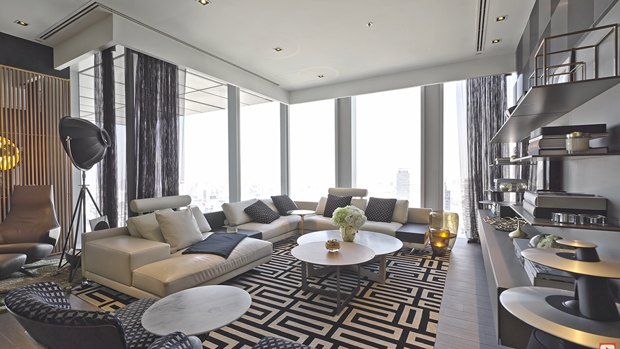 Open-plan living and dining area inside a Ritz-Carlton Residences Mahanakhon two-bedroom condo