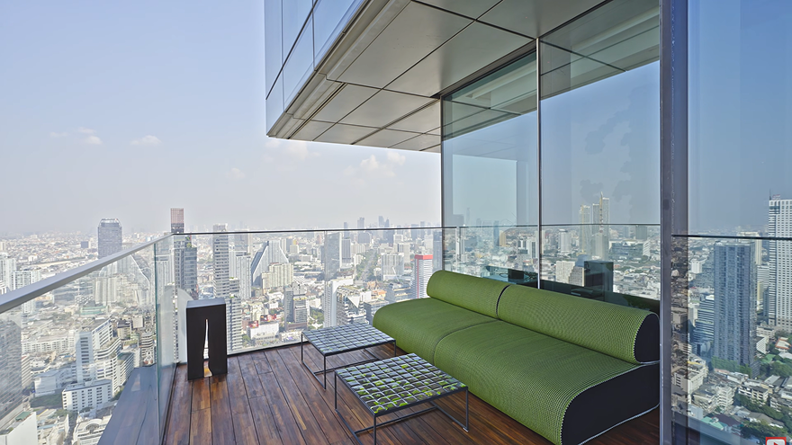 Private terrace at Ritz-Carlton Residences Mahanakhon with seating and Bangkok skyline view
