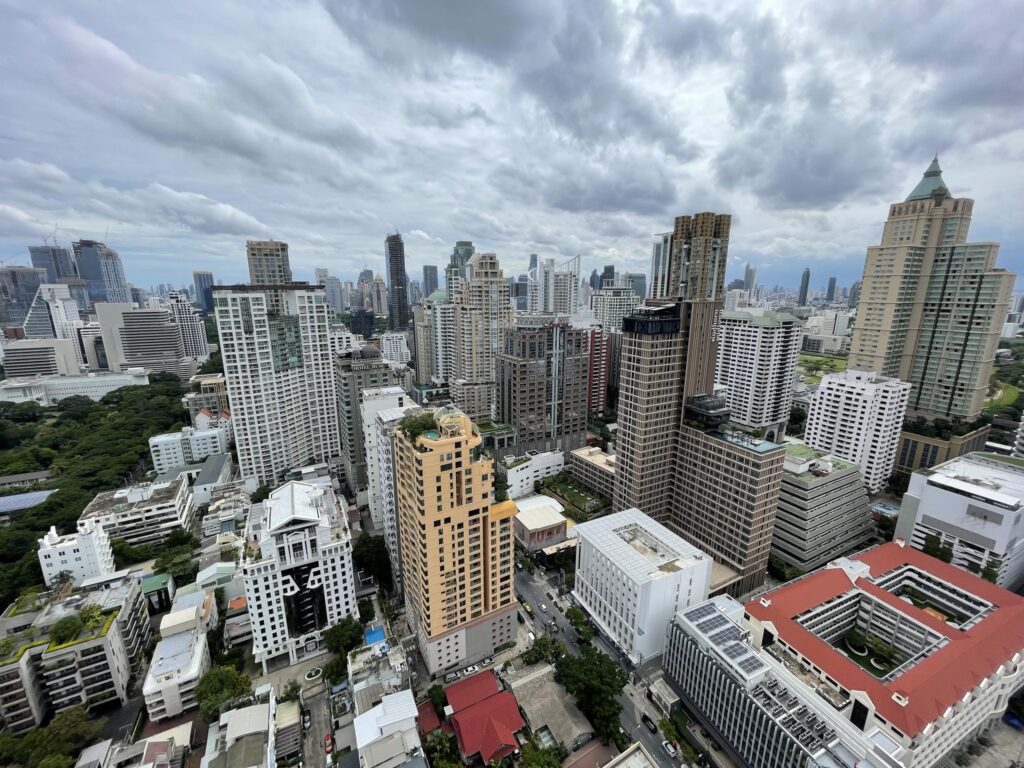 An aerial view over the dense mid-rise streets of the Chitlom and Langsuan neighbourhood