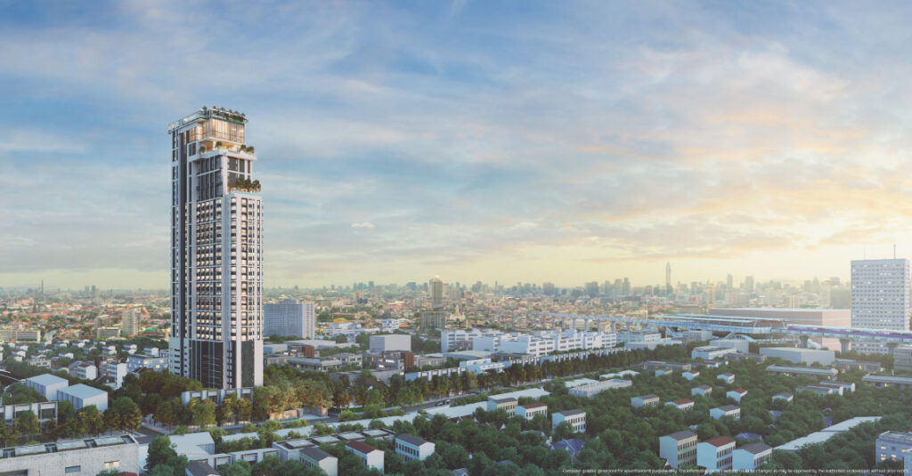 Slim high-rise tower catching golden sunset light above low-rise Bangkok rooftops and greenery