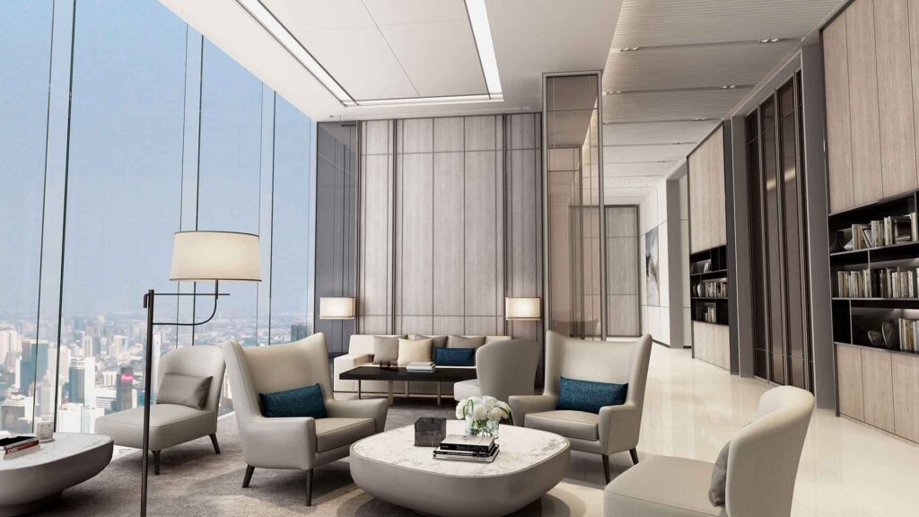 The residents' library at Banyan Tree Residences, with armchairs facing a city view