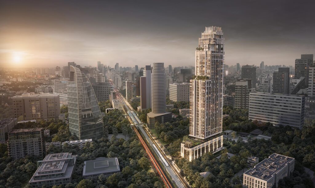 The Hyde Heritage Thonglor tower in hazy morning light above the surrounding district