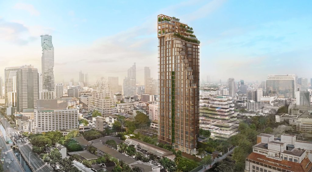 Slim tree-topped residential tower rising above low-rise city blocks, daylight render