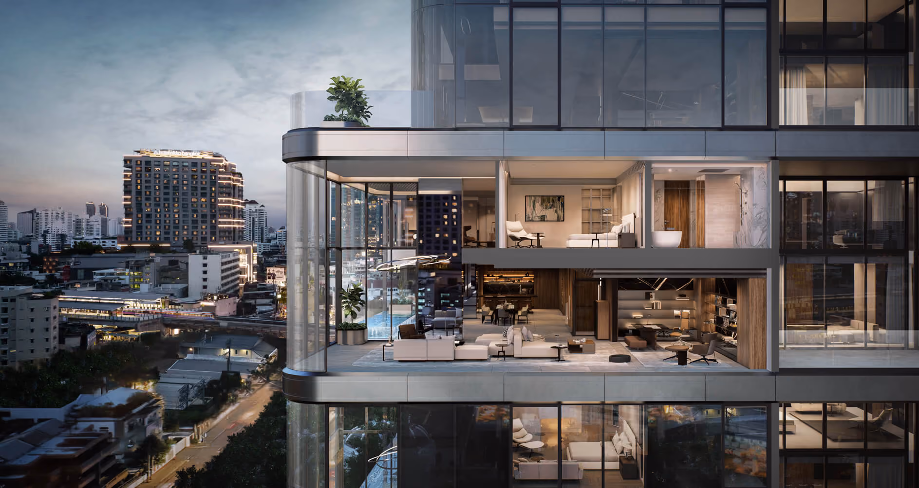 Render of curved glass balconies and softly lit interiors on upper tower floors above the city