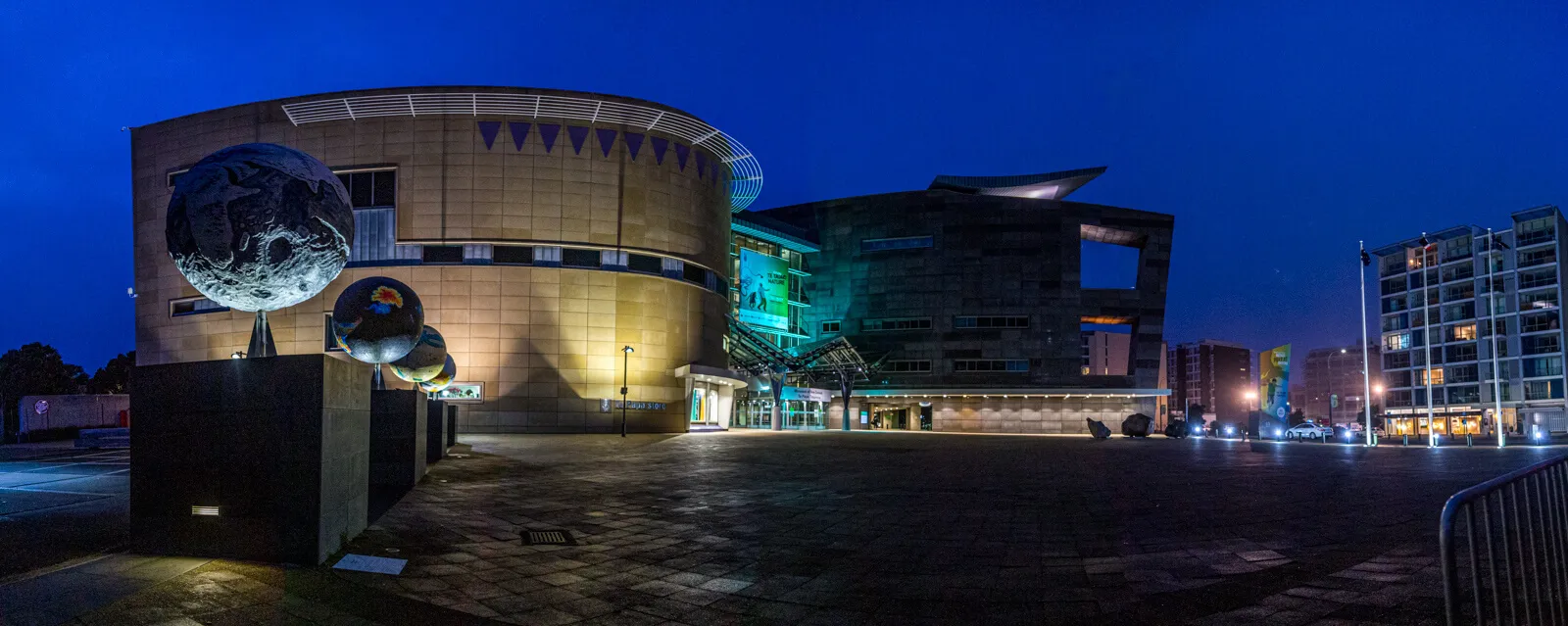 Panoramic night view of Te Papa and the Wellington waterfront.