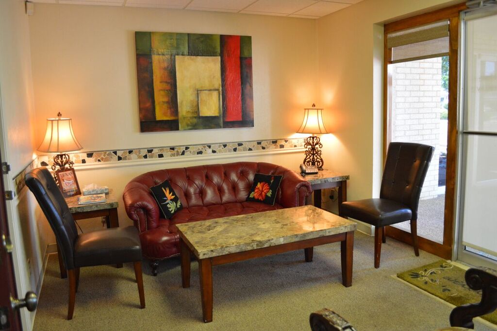 Reception area at Steven T. Cutbirth DDS in Waco, TX with a welcoming front desk and patient check-in area.