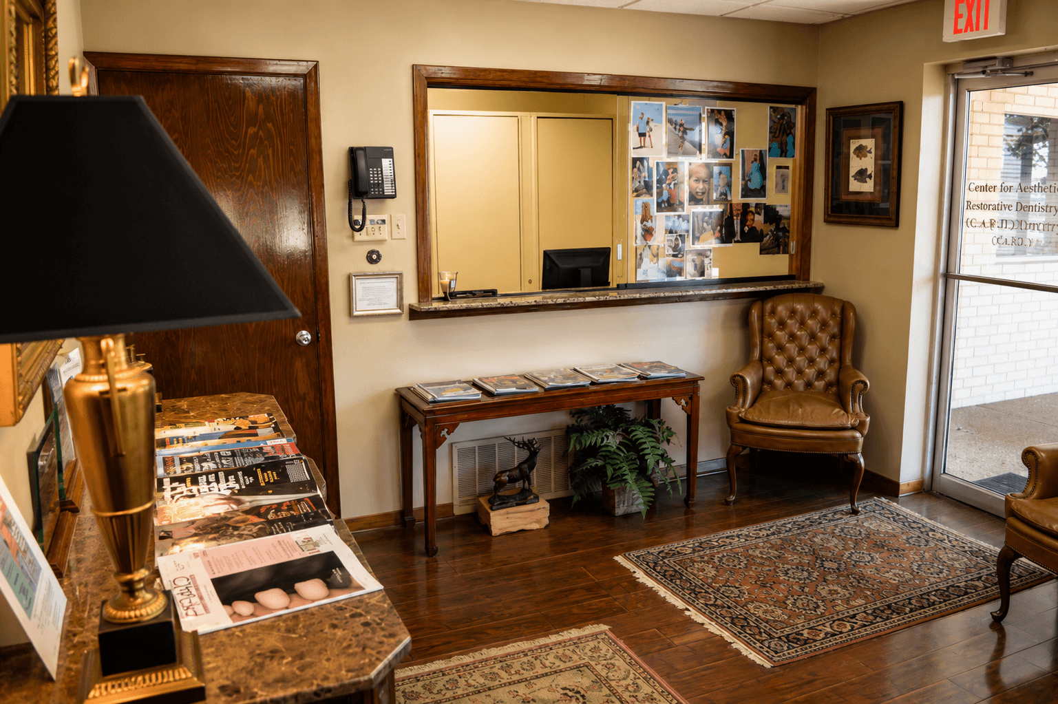 Comfortable patient waiting area at Steven T. Cutbirth DDS featuring seating, artwork, and a relaxing atmosphere.