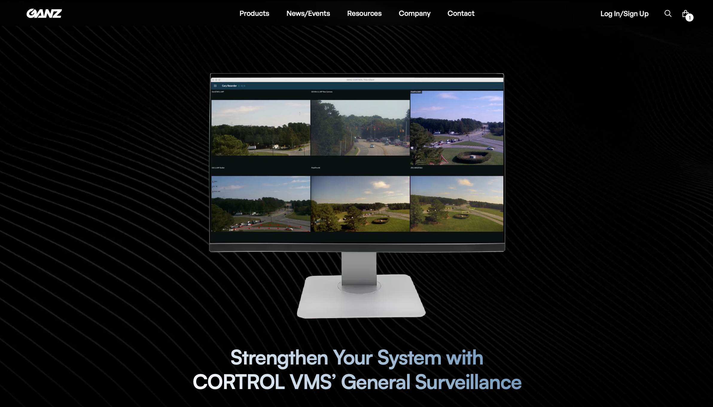 Computer monitor displaying six surveillance camera views of outdoor roads and intersections.
