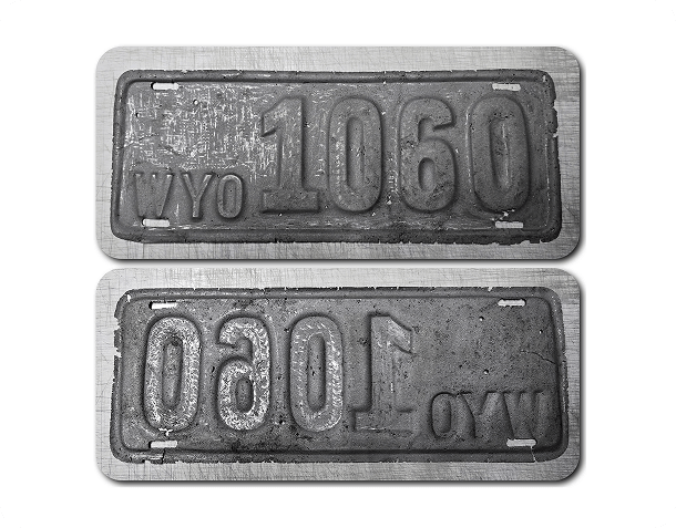Two black Maryland license plates from 1981 with raised white characters on a white background.