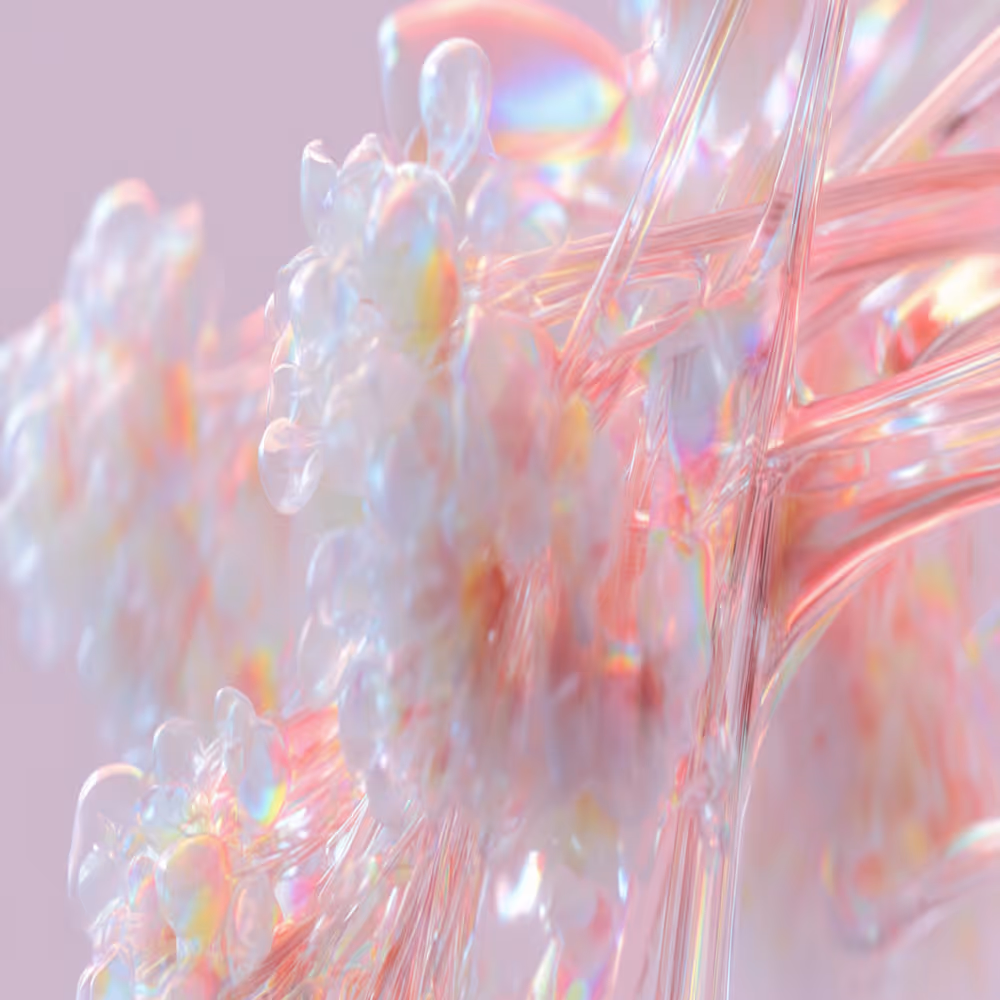 Abstract close-up of translucent, iridescent, bubble-like clusters and strands on a soft pink background.