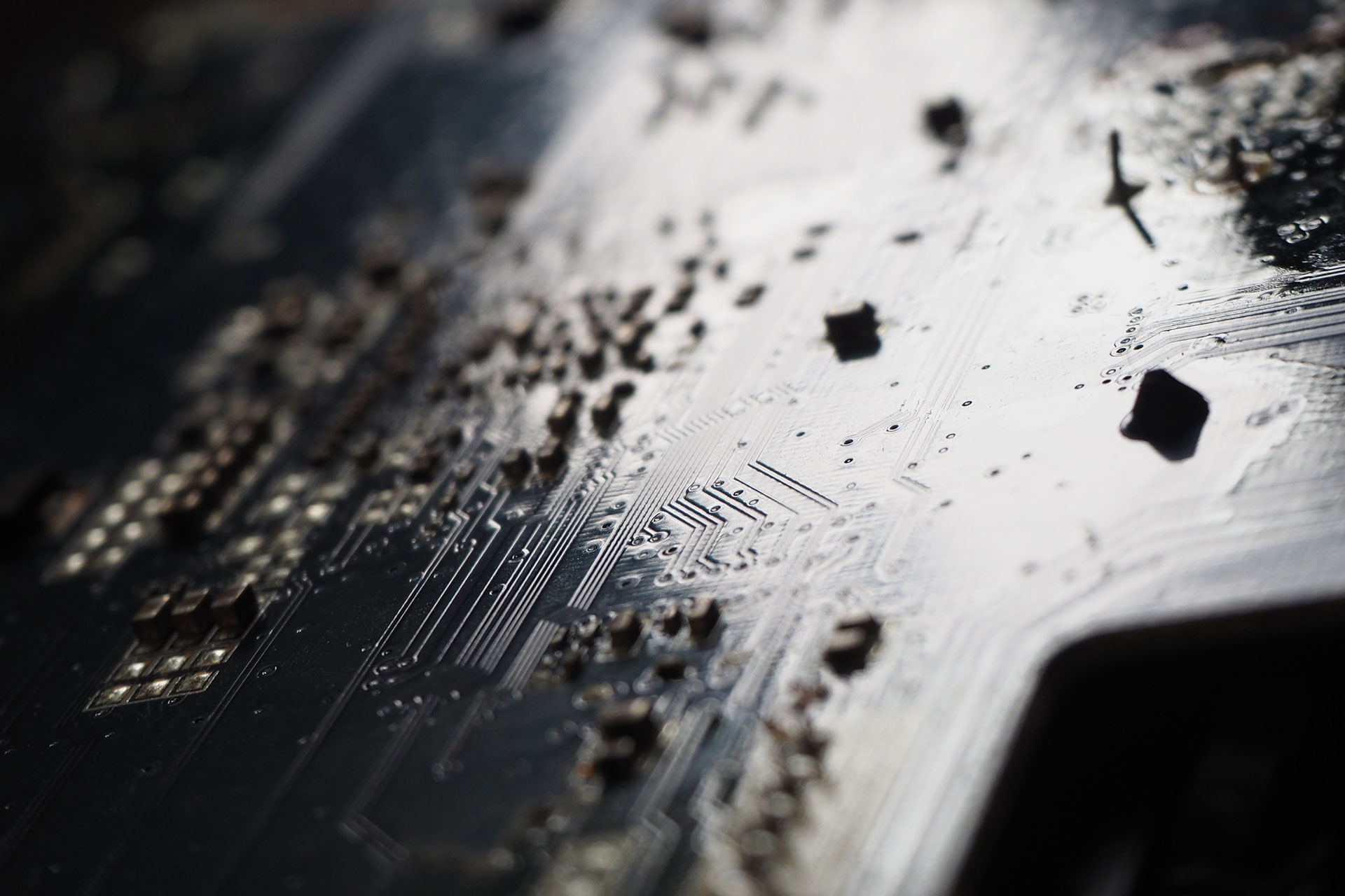 Close-up circuit board texture representing Sequel Data Systems' engineering culture