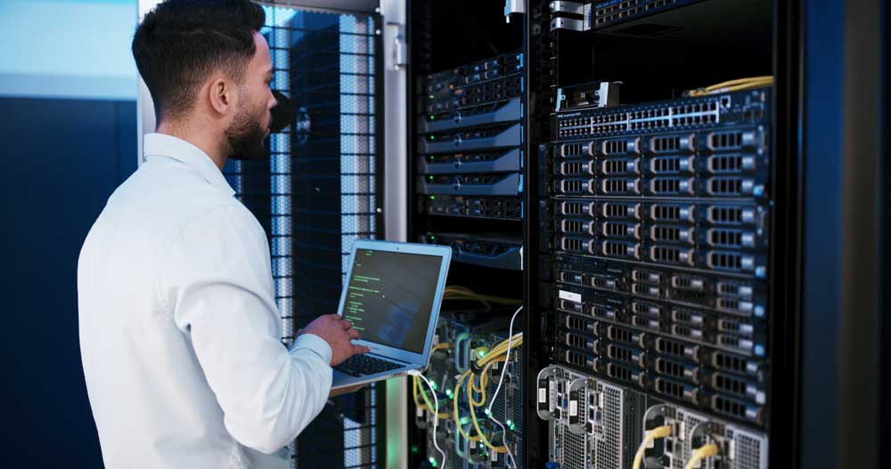 Sequel-Data-Systems-engineer-running-diagnostics-on-data-center-server-hardware