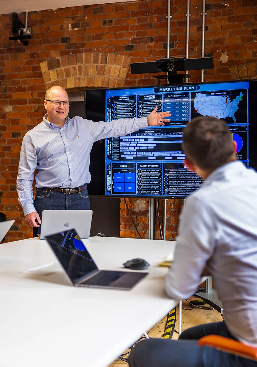 Marketing plan displayed on screen during a New Era Marketing strategy session
