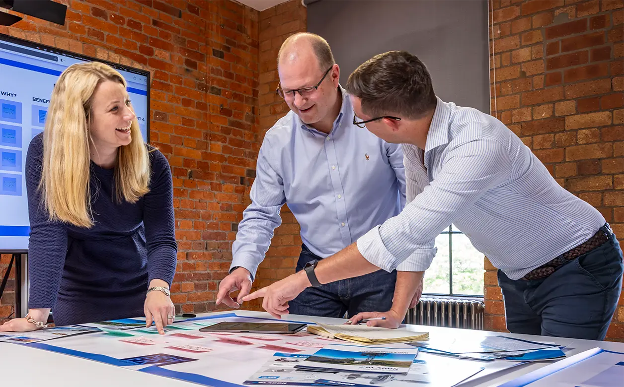 New Era Marketing team reviewing B2B lead generation strategy