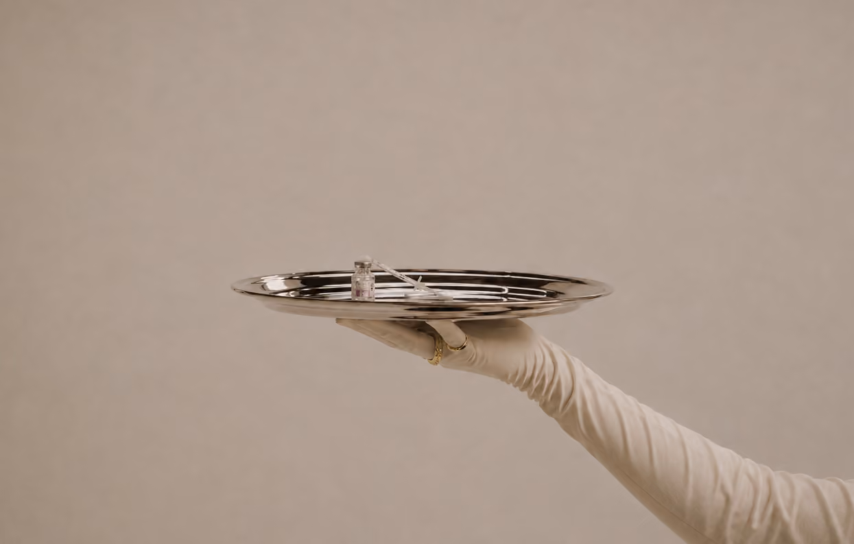 Healthcare professional holding a medical tray
