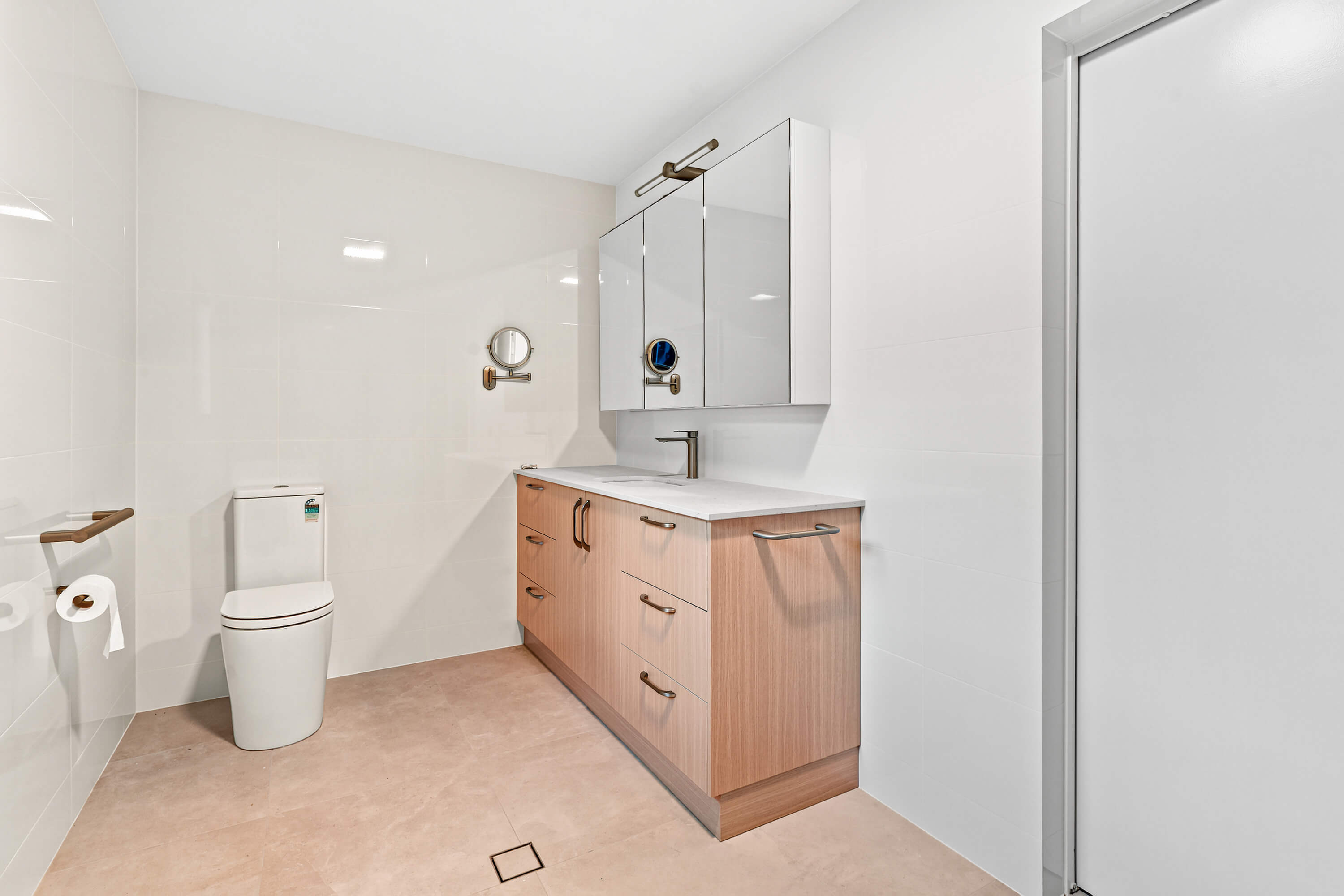 Bathroom with timber-look vanity and mirrored cabinet at Franklin Ave, Encounter Bay