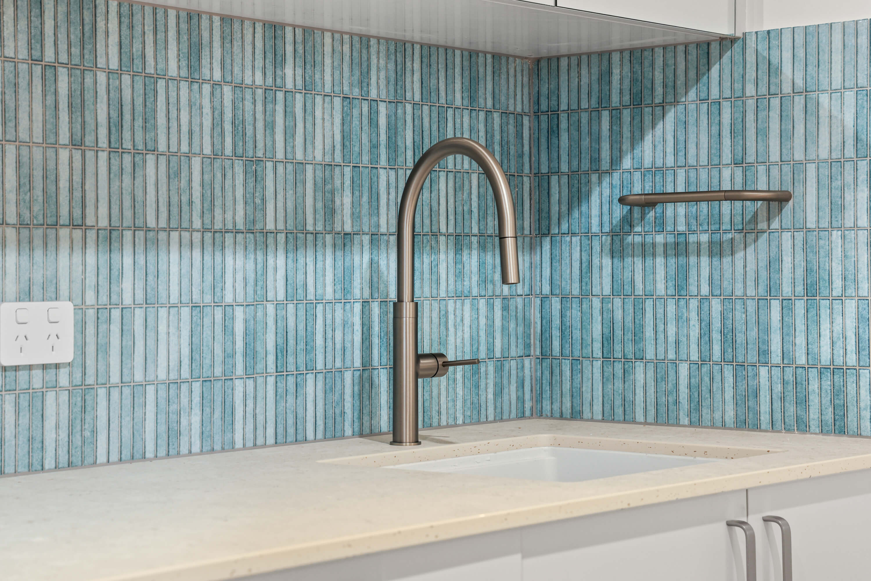 Blue kit-kat mosaic splashback with brushed nickel mixer at Franklin Ave, Encounter Bay
