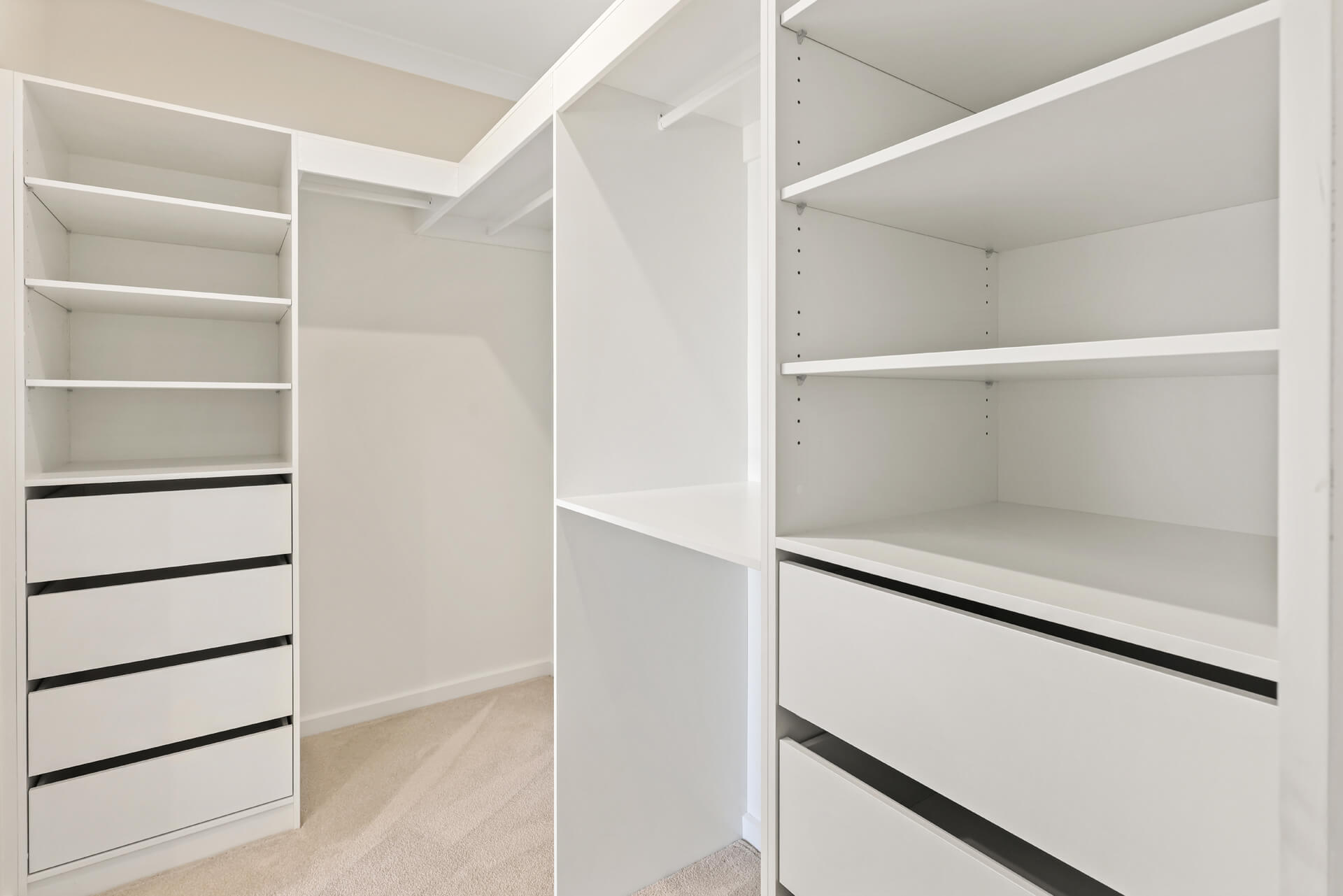 Walk-in robe fitout with shelving, drawers and hanging rails at Victoria St, Victor Harbor