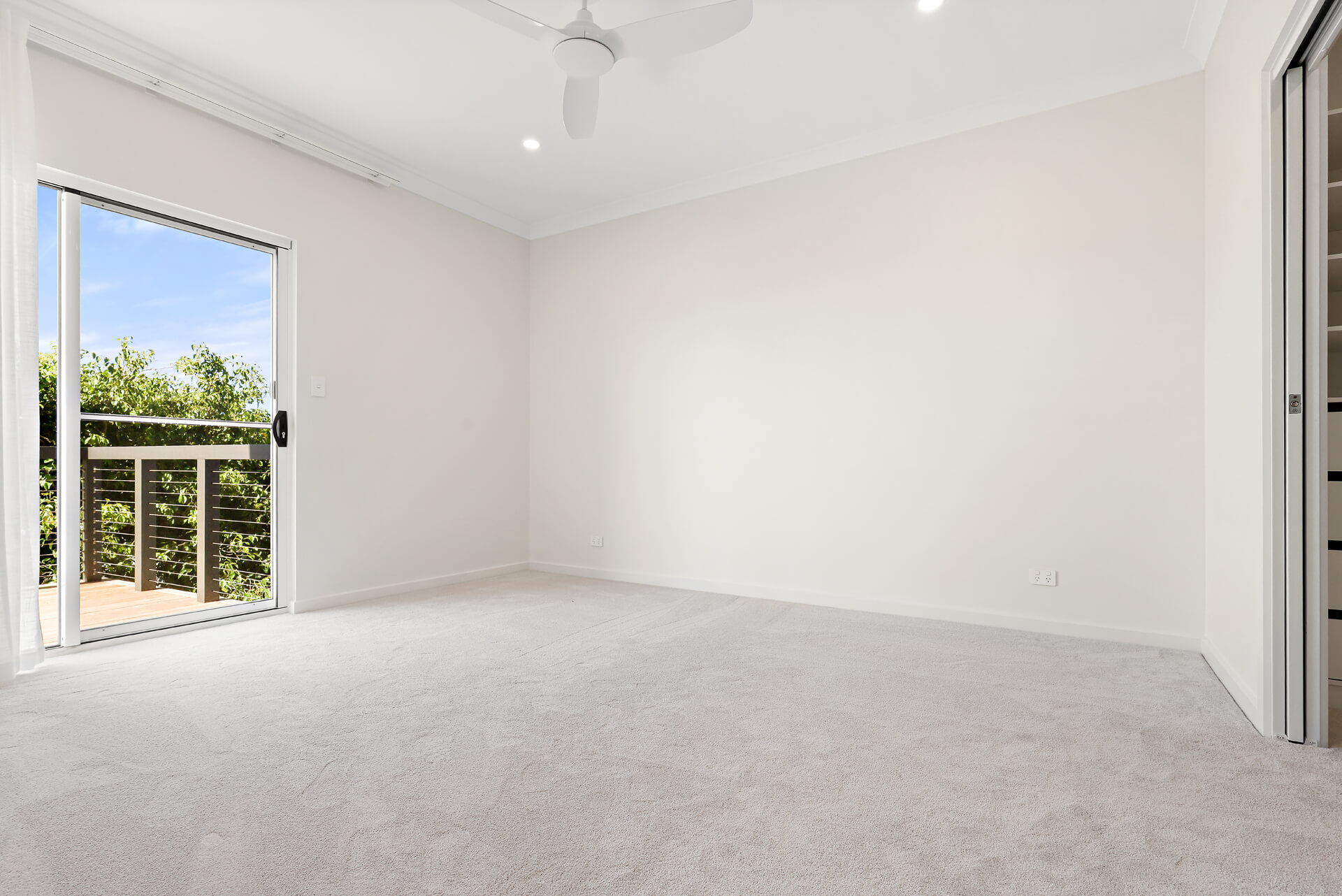 Upstairs bedroom with balcony access and new carpet at Victoria St, Victor Harbor
