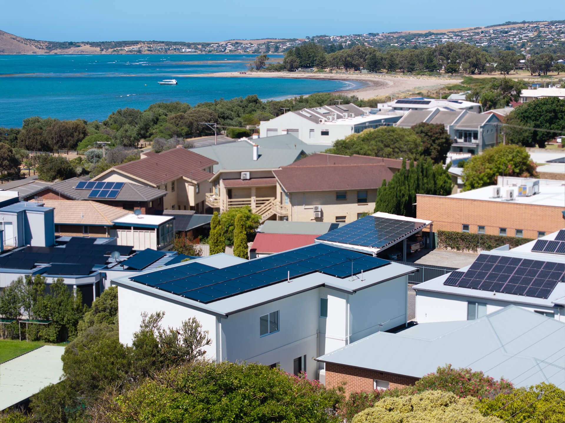 Aerial view over Victor Harbor rooftops to Encounter Bay from the Victoria St home