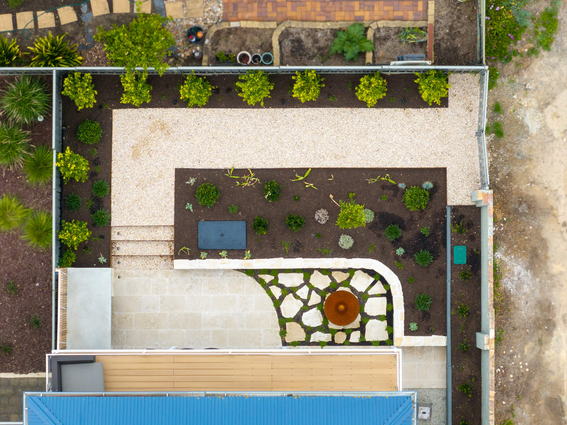 Overhead view of landscaping at Henry St, Port Elliot, with crazy paving, fire bowl and new plantings
