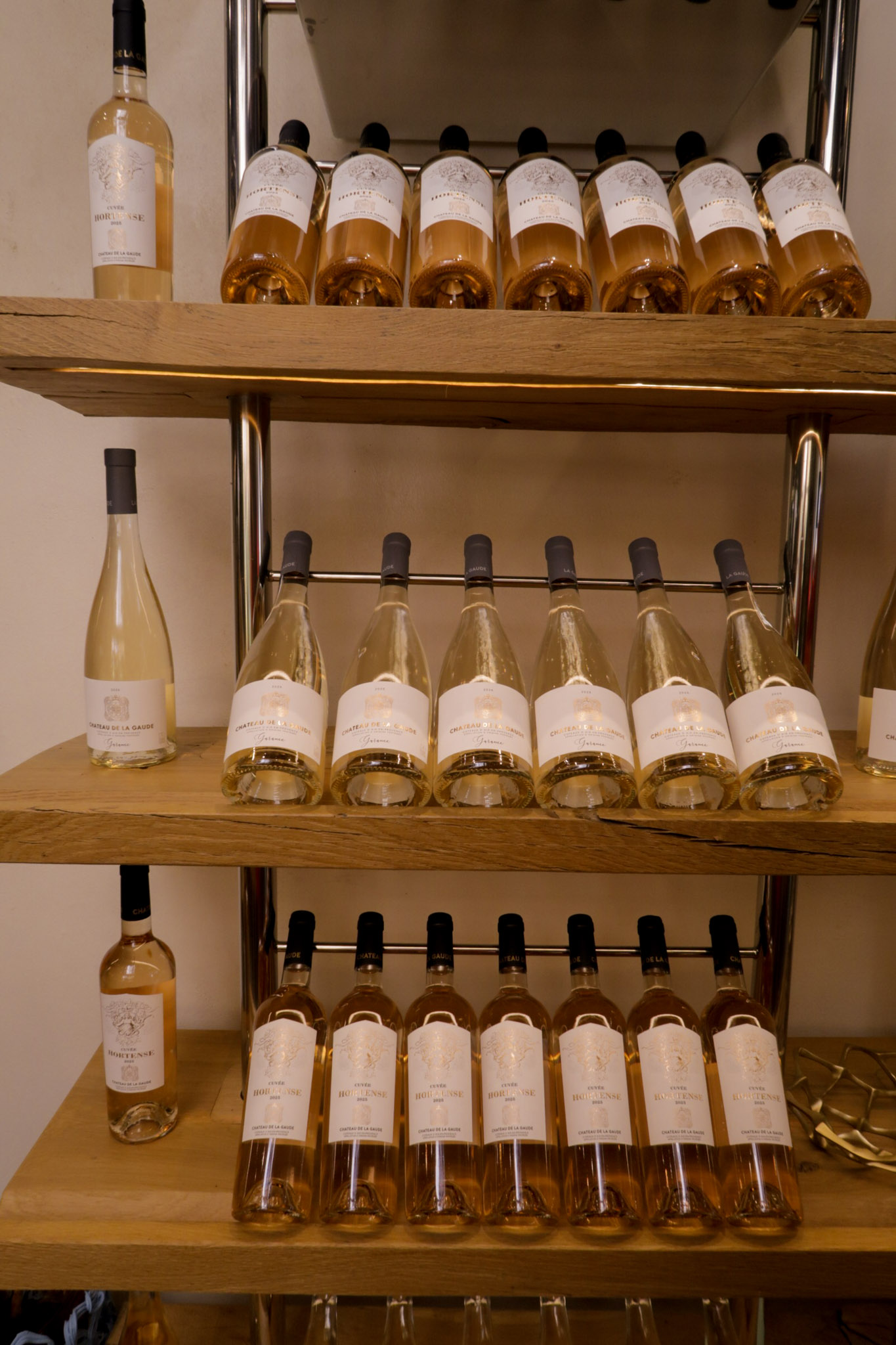Wine bottles on display at Château de la Gaude