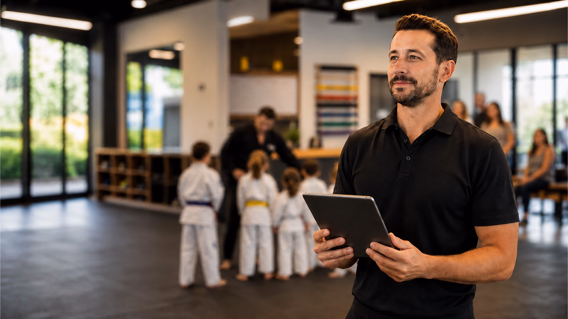 Studio owner reviewing growth numbers with the MyStudio dashboard