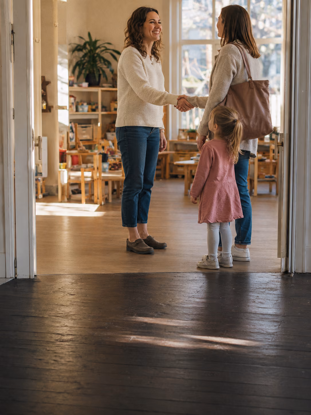 Parent and child arriving at an enrichment program