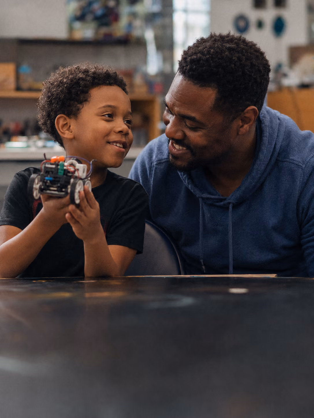 Parent and child engaged together at an enrichment activity