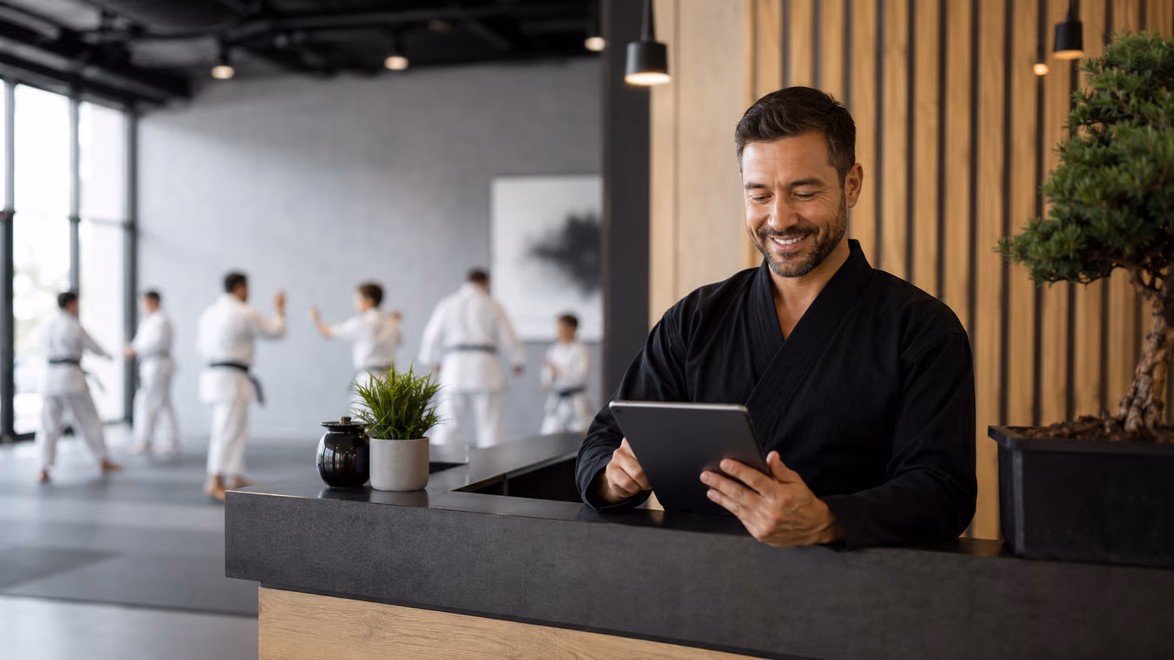 Studio owner reviewing growth numbers with the MyStudio dashboard