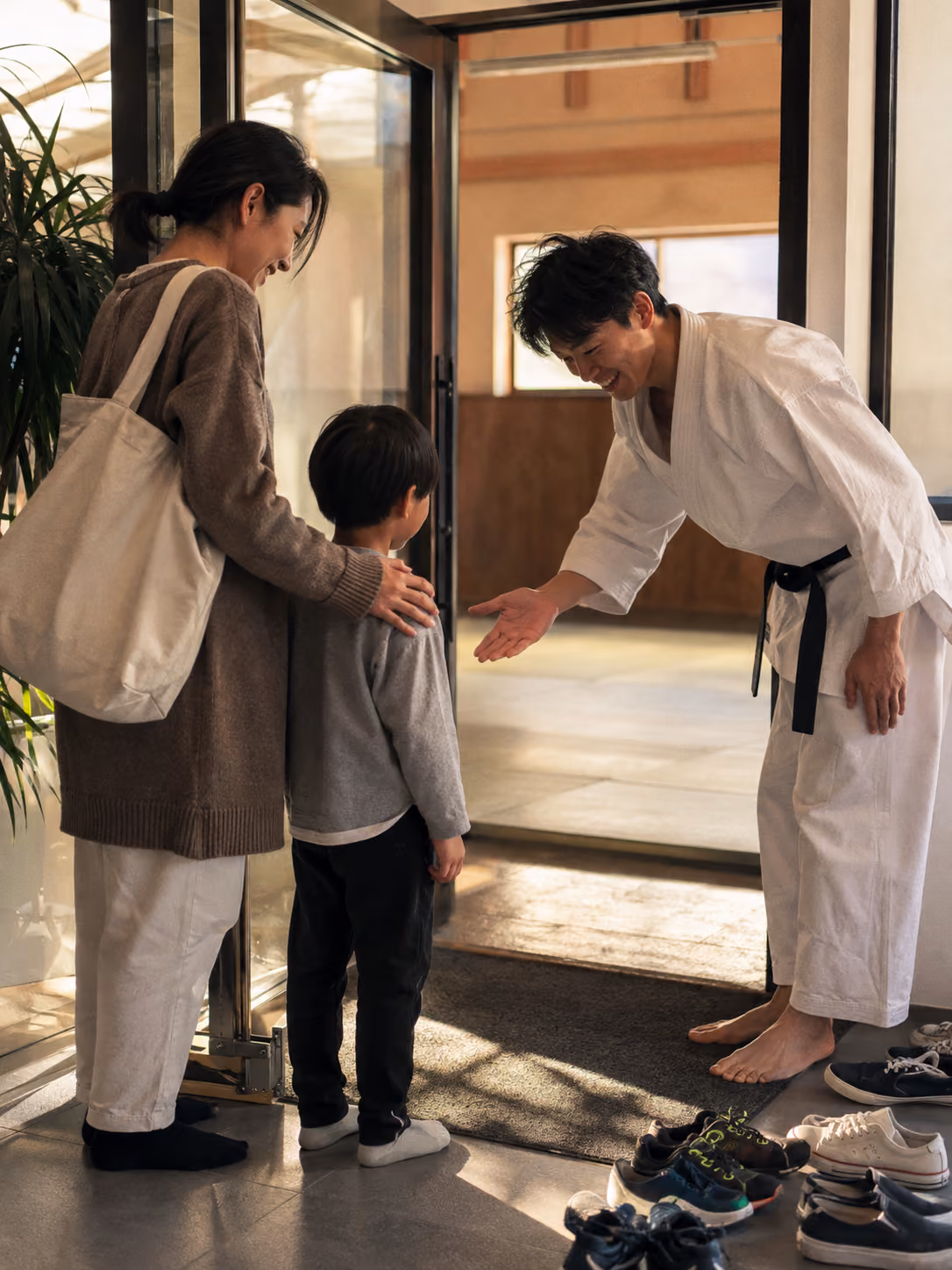 Parent and child arriving at an enrichment program