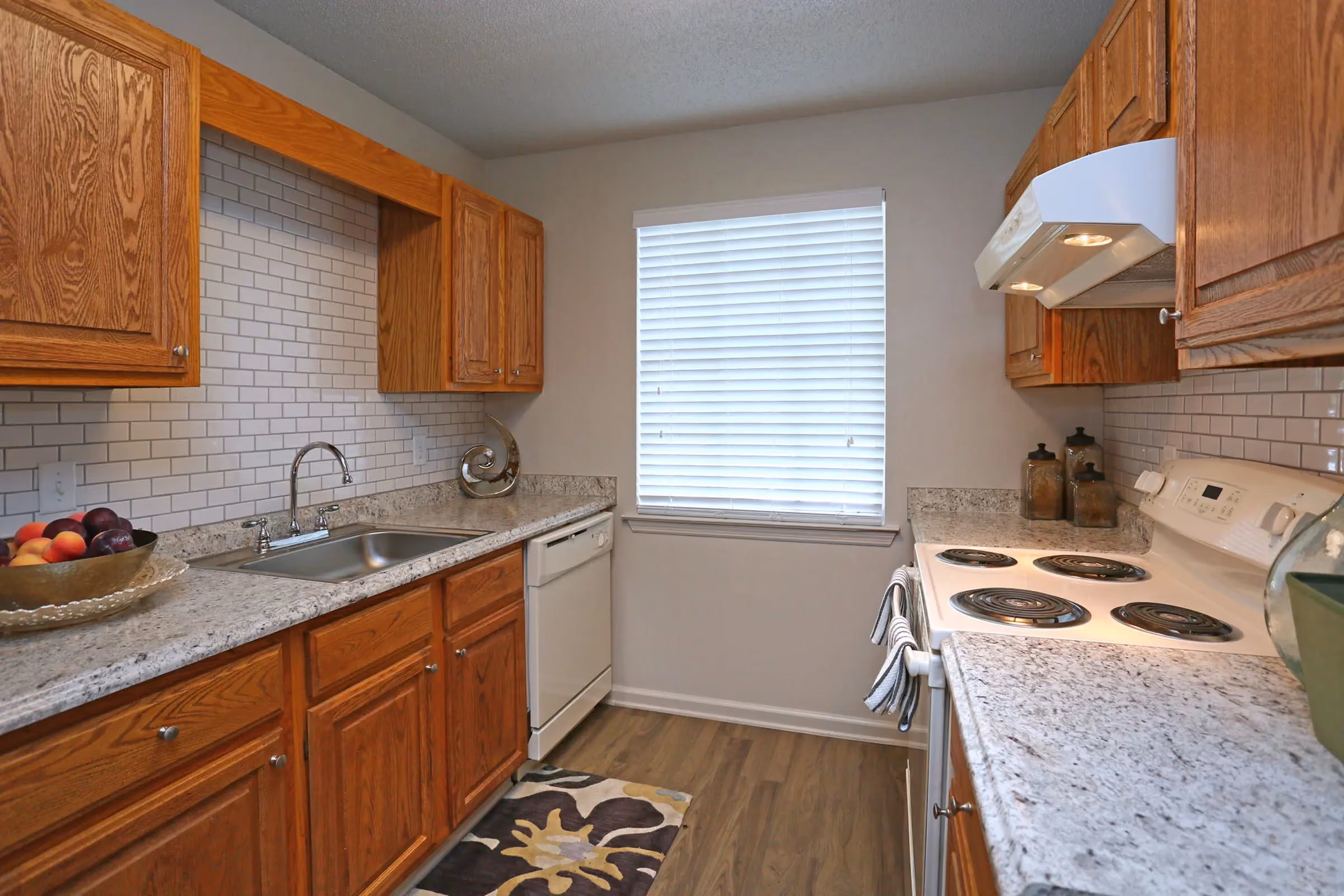 Kitchen with brown cabinets